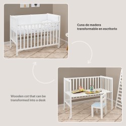 Cuna transformable en escritorio en blanco.