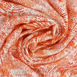 Viscosa Sandra en Coral-Tela  viscosa con estampado abstracto en color coral.